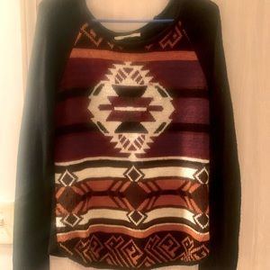 Tribal sweater with red, brown, and tan print